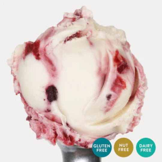 A scoop of Triple Berry Oat Milk Ice Cream on a white background