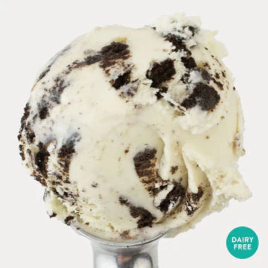 A scoop of Peanut Butter Oreo Oat Milk Ice Cream on a white background