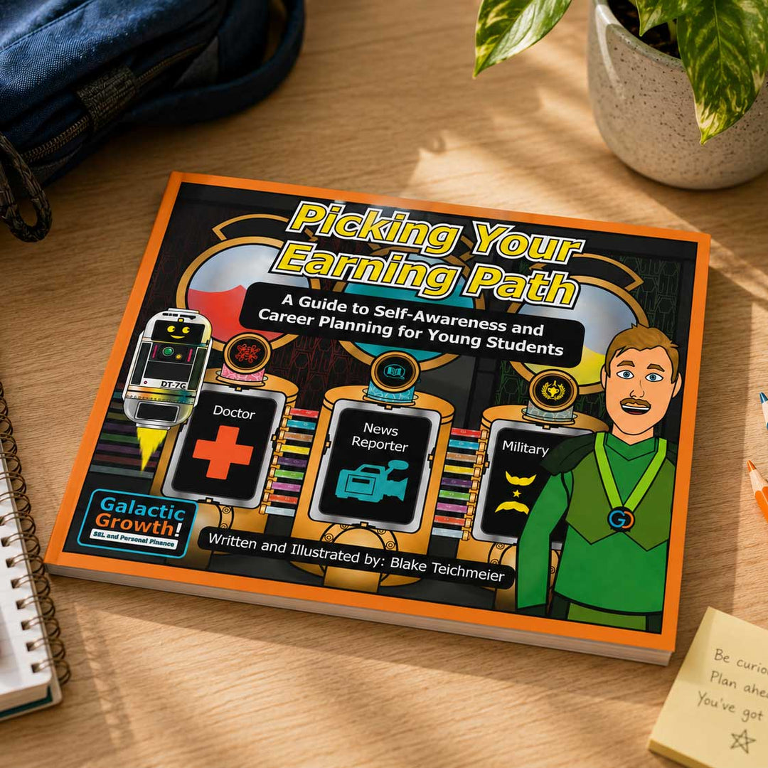 A colorful printed booklet titled "Picking Your Earning Path" lies on a wooden desk, surrounded by a blue backpack, notebook pages, a potted plant, and a sticky note. The cover shows illustrated robot career icons and a cartoon character, with the Galactic Growth logo in the lower left.