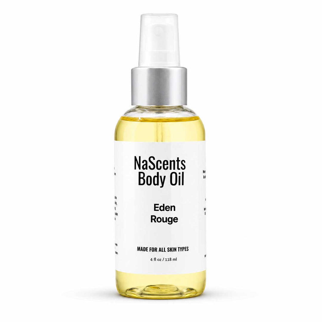 A bottle of NaScents Body Oil in the Eden Rouge scent, featuring a clear glass bottle filled with pale yellow oil, a white label with black text, and a silver pump dispenser, set against a plain white background.