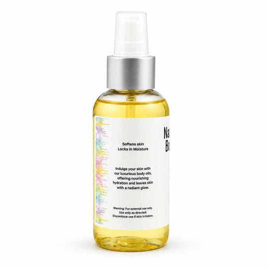 A clear bottle of Neat Body Nourishing Body Oil with a white spray cap and silver pump, filled with yellow oil, on a white background.