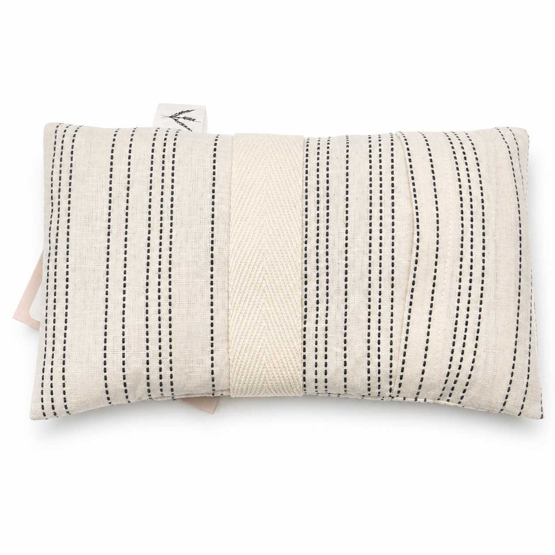 Rectangular pillow with black stripes on a white background