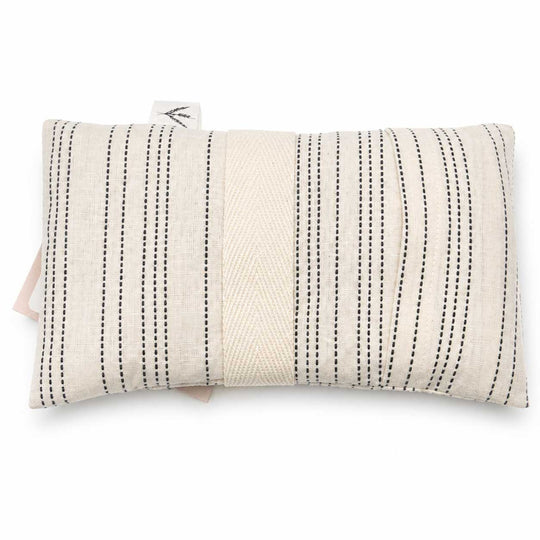 Rectangular pillow with black stripes on a white background