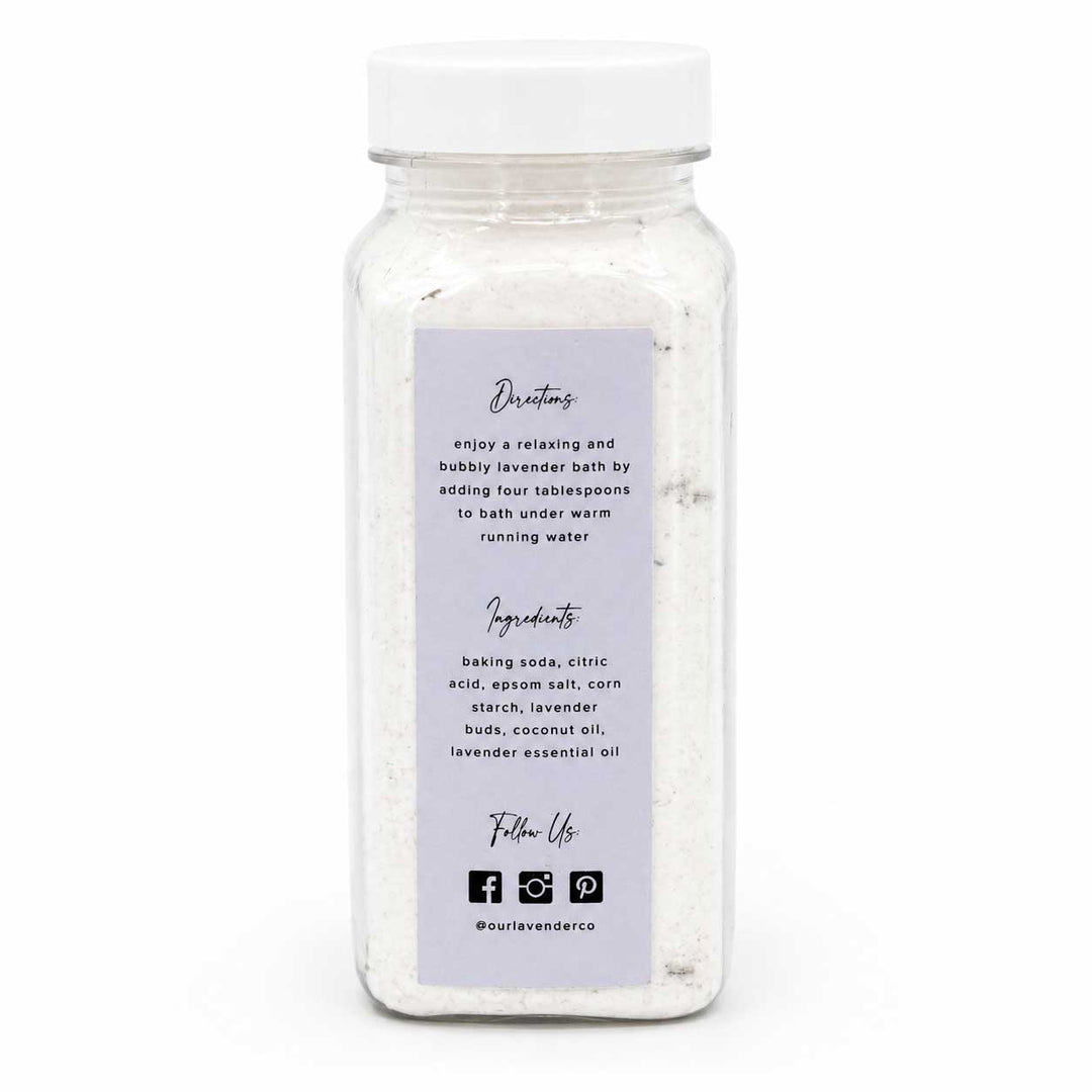 Bottle of bath salts with a label on a white background