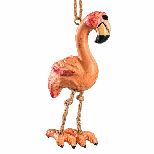 A hand-painted decorative flamingo ornament with a natural rope leg and hanging loop, shown against a plain white background.