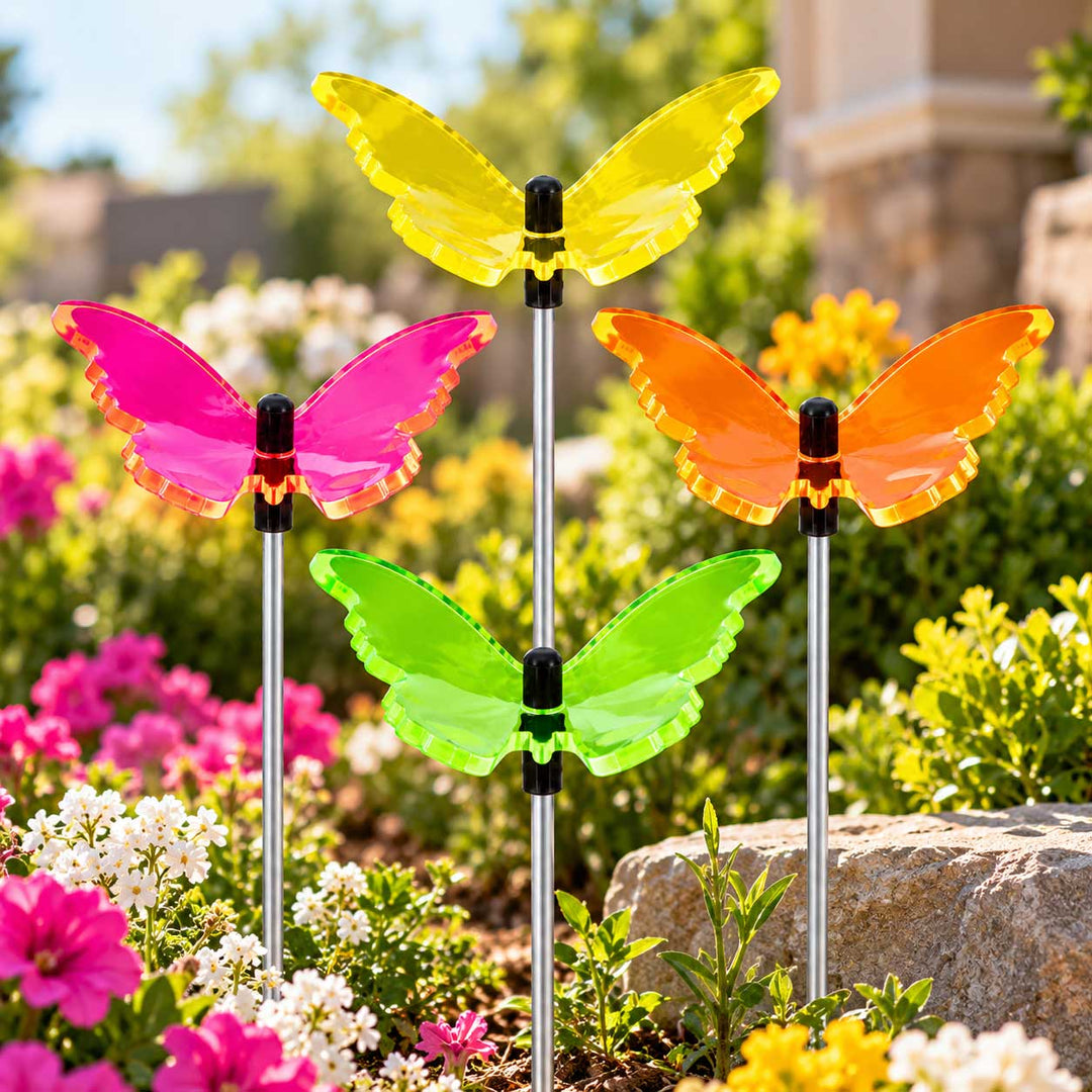 four yard decor butterflies in a garden setting