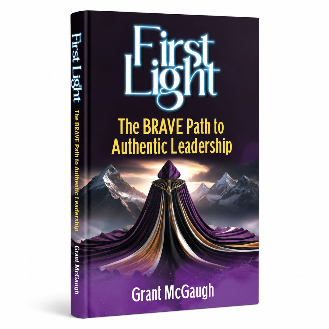 Book titled 'First Light: The BRAVE Path to Authentic Leadership' by Grant McGaugh with a purple and black cover.