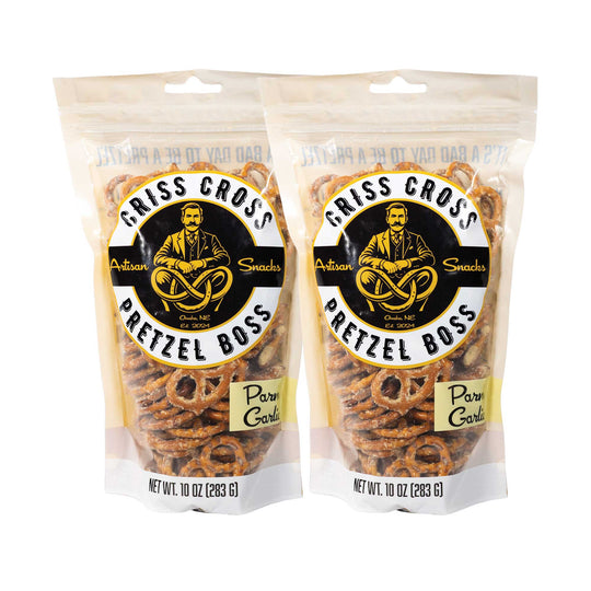 Two packages of Criss Cross Pretzel Boss Parm Garlic pretzels on a white background