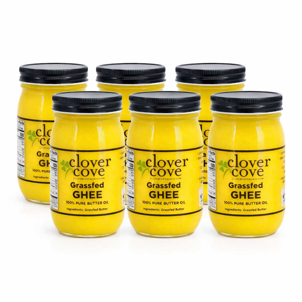 Six jars of Clover Cove Grassfed Ghee on a white background