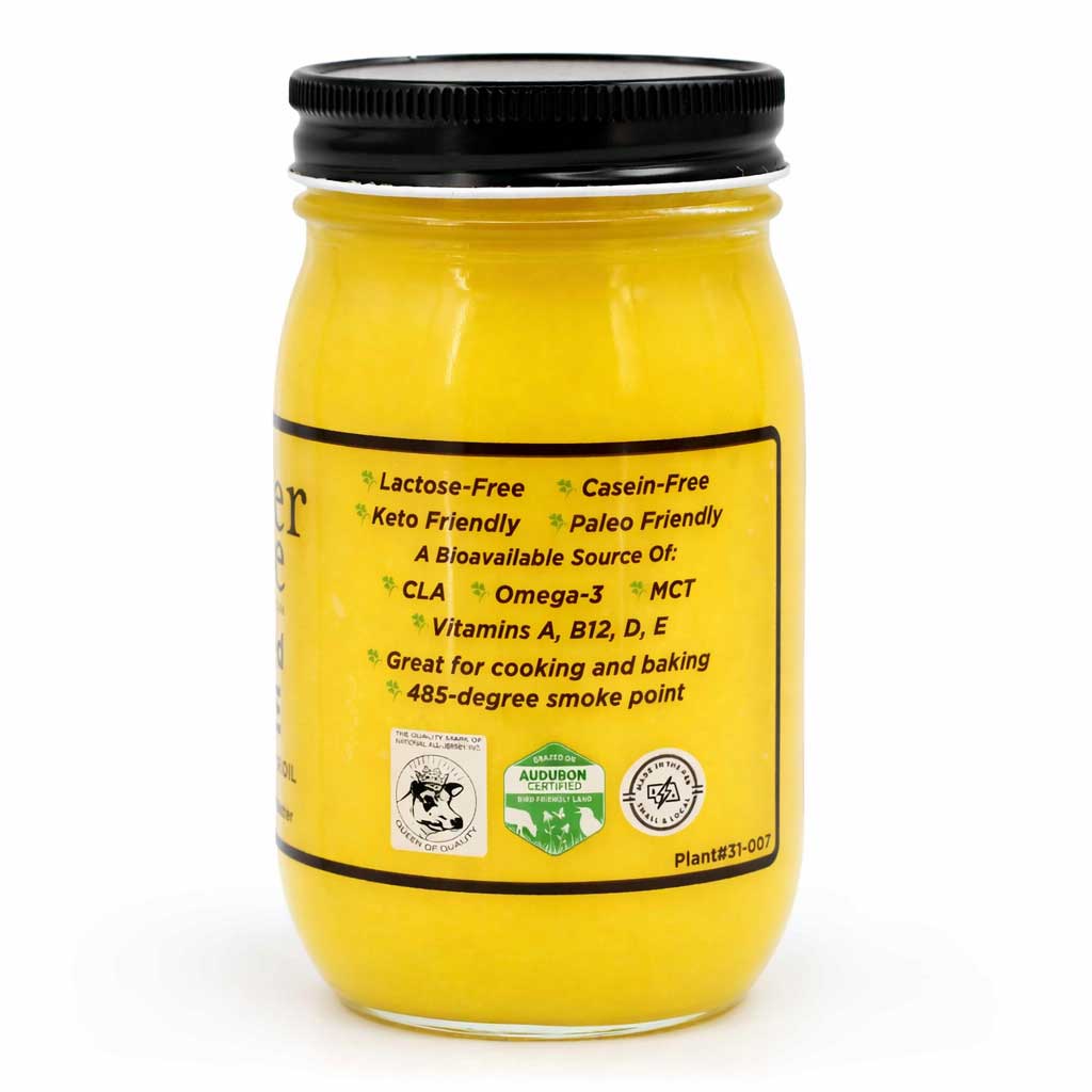Yellow jar with black lid on a white background
