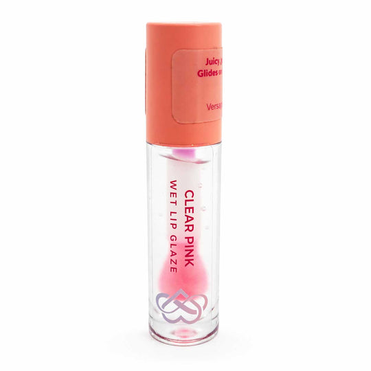 Clear pink wet lip glaze with coral cap on a white background