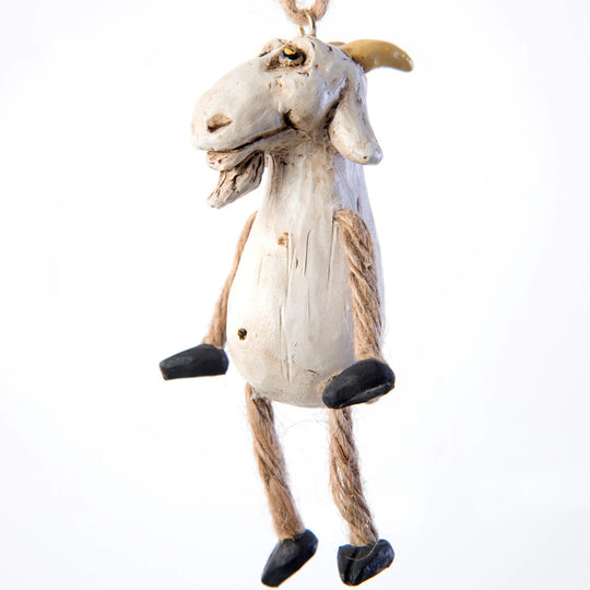 Decorative goat ornament on a white background