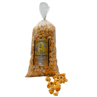 Cheddar Cheese Popcorn | Gourmet | 7 oz. bag | Non-GMO | All Natural | Made with Corn Oil | Made with Real Cheese | Savory and Divine Taste | Fresh Batches | Light and Fluffy Popped Kernels | Perfect for On the Go | Nebraska Cheese Popcorn