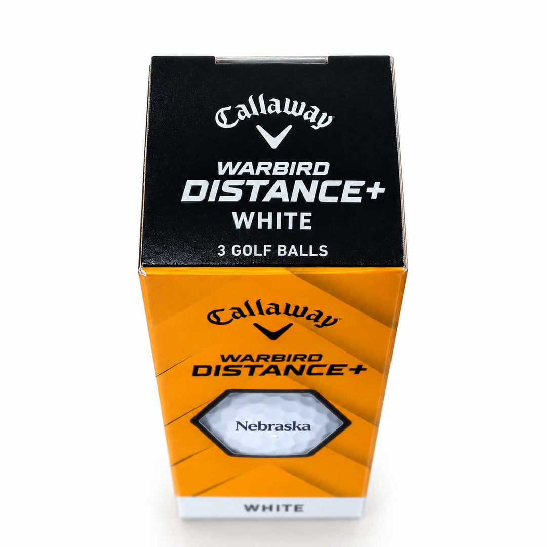 Callaway Warbird Distance+ White golf ball box, containing 3 golf balls. The packaging features a black top panel and a bright orange lower panel with a hexagonal window showing the white golf ball inside.