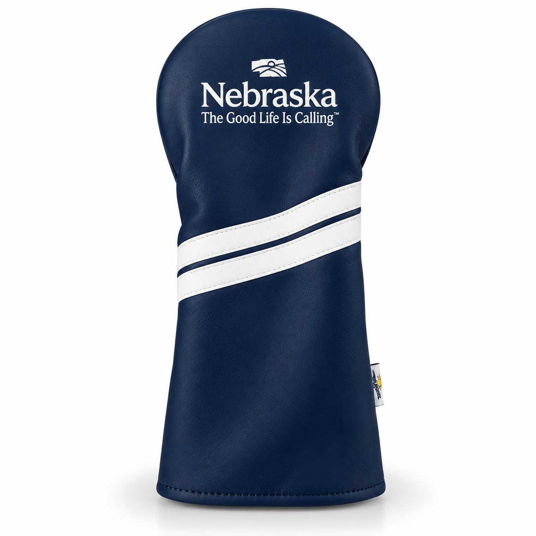 A navy blue golf club headcover with white stripes and 'Nebraska The Good Life Is Calling' text printed on the front, set against a plain white background.