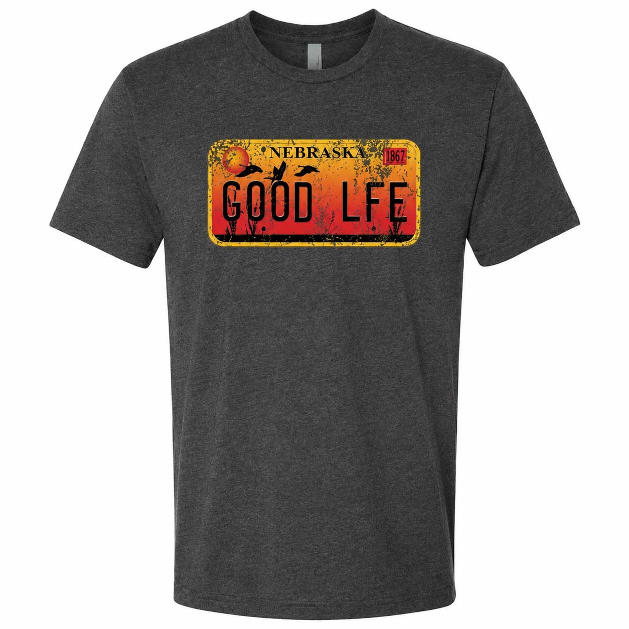 A dark heather gray crewneck t-shirt featuring a distressed Nebraska license plate graphic on the chest with the words 'GOOD LIFE' in black.