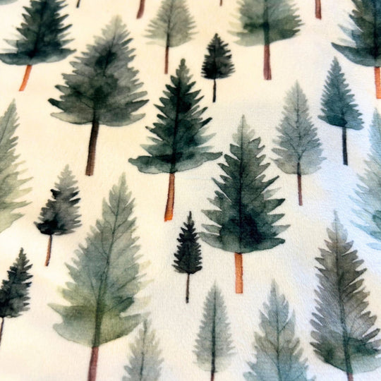 Pattern of watercolor trees on a light background