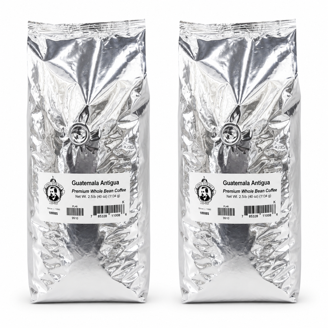 Two packages of Guatemala Antigua coffee on a white background