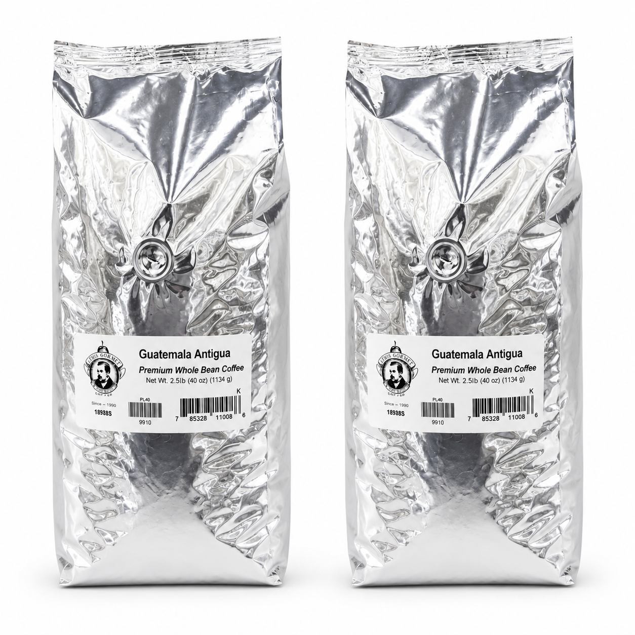 Two packages of Guatemala Antigua coffee on a white background