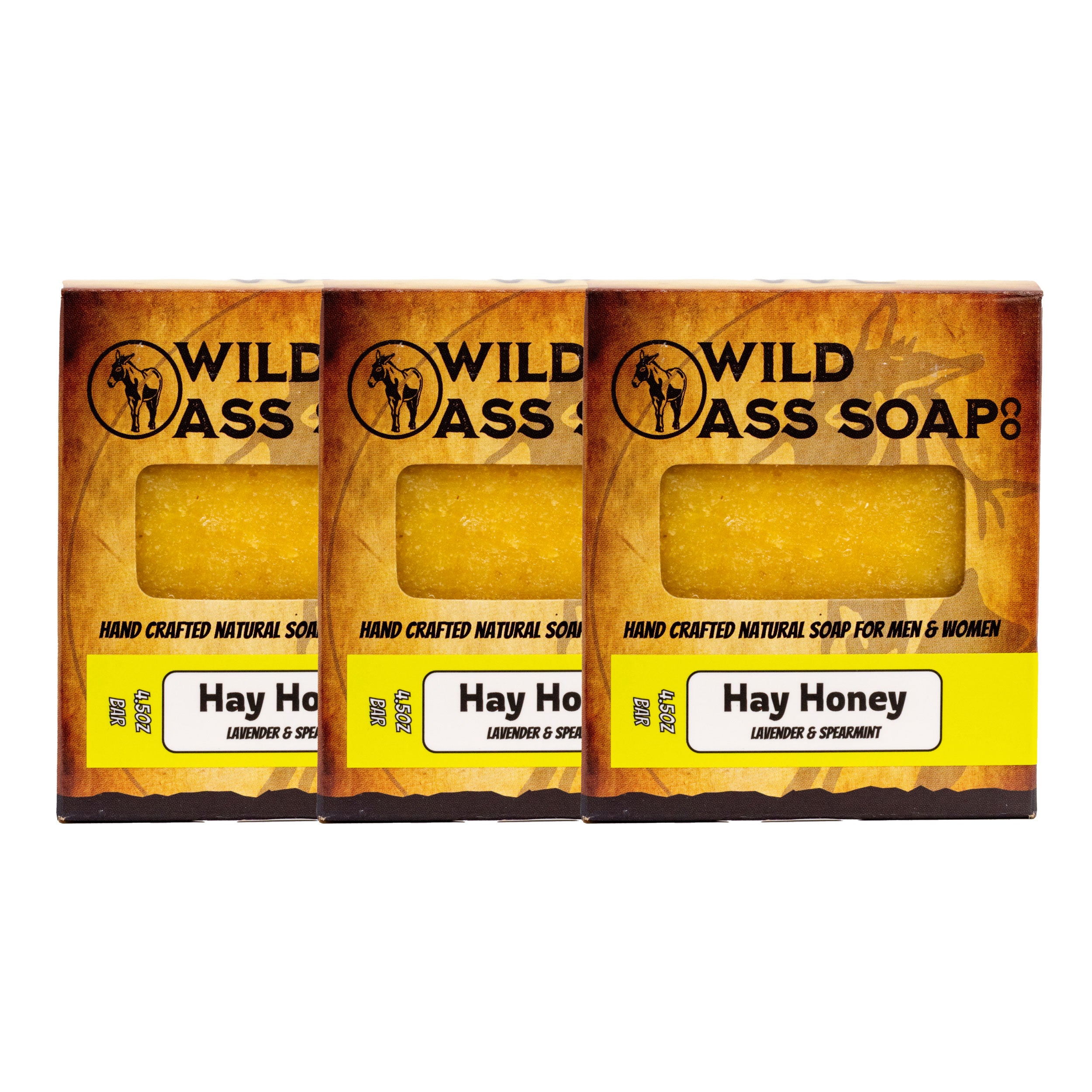 Three bars of Wild Ass Soap with 'Hay Honey' label on a white background