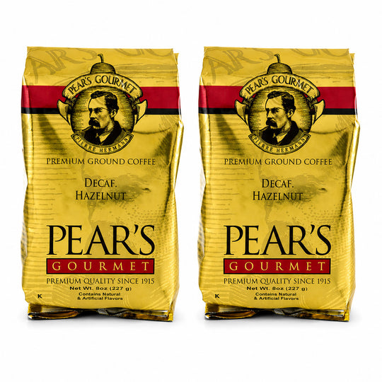 Two packages of Pear's Gourmet Decaf Hazelnut coffee on a white background