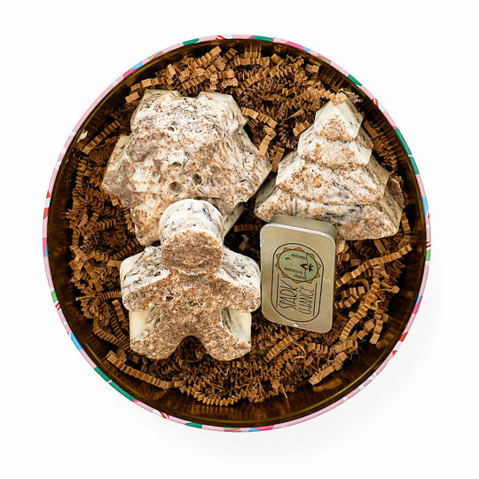 Fire Starters in a round box with decorative paper on a white background