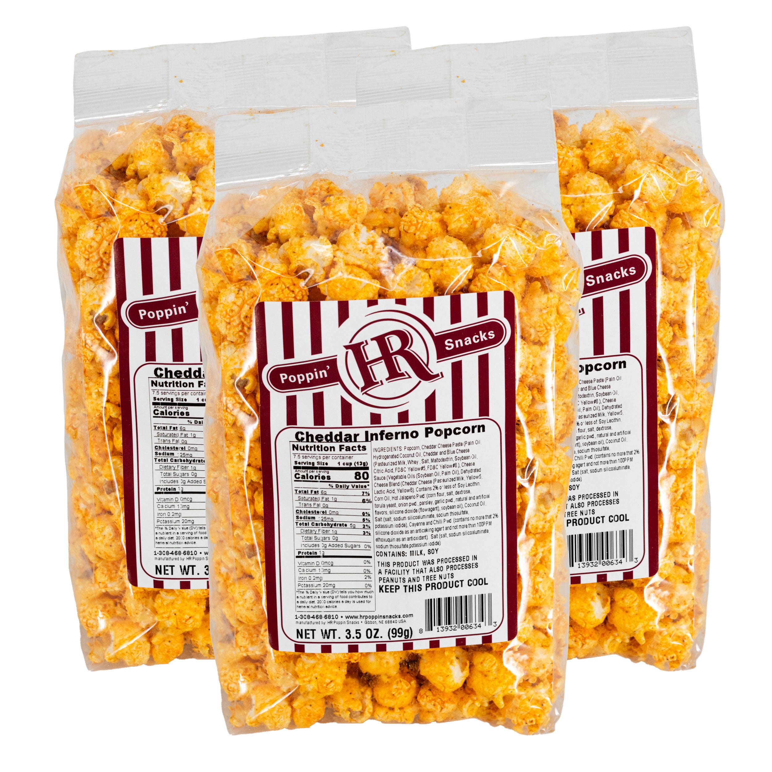 Three bags of Cheddar Inferno popcorn with Poppin' Cheddar label on a white background