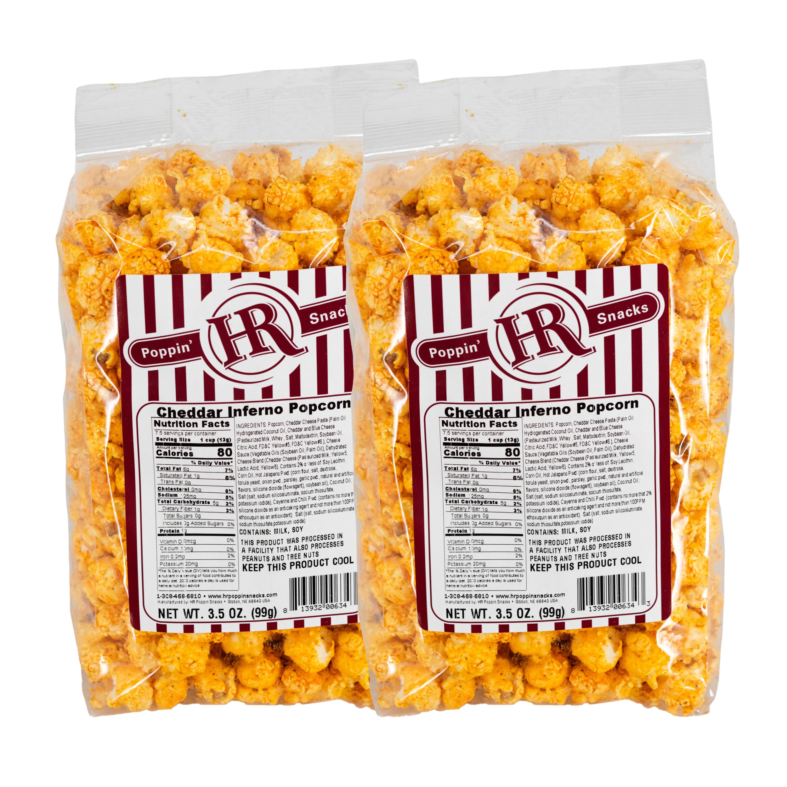 Two packages of Cheddar Inferno popcorn with visible labels on a white background