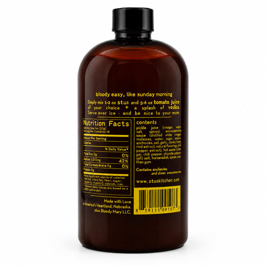 A dark amber plastic bottle with a black cap, showing the back label of a Bloody Mary sauce product. The label features yellow text and a yellow nutrition facts panel, set against a plain white background.