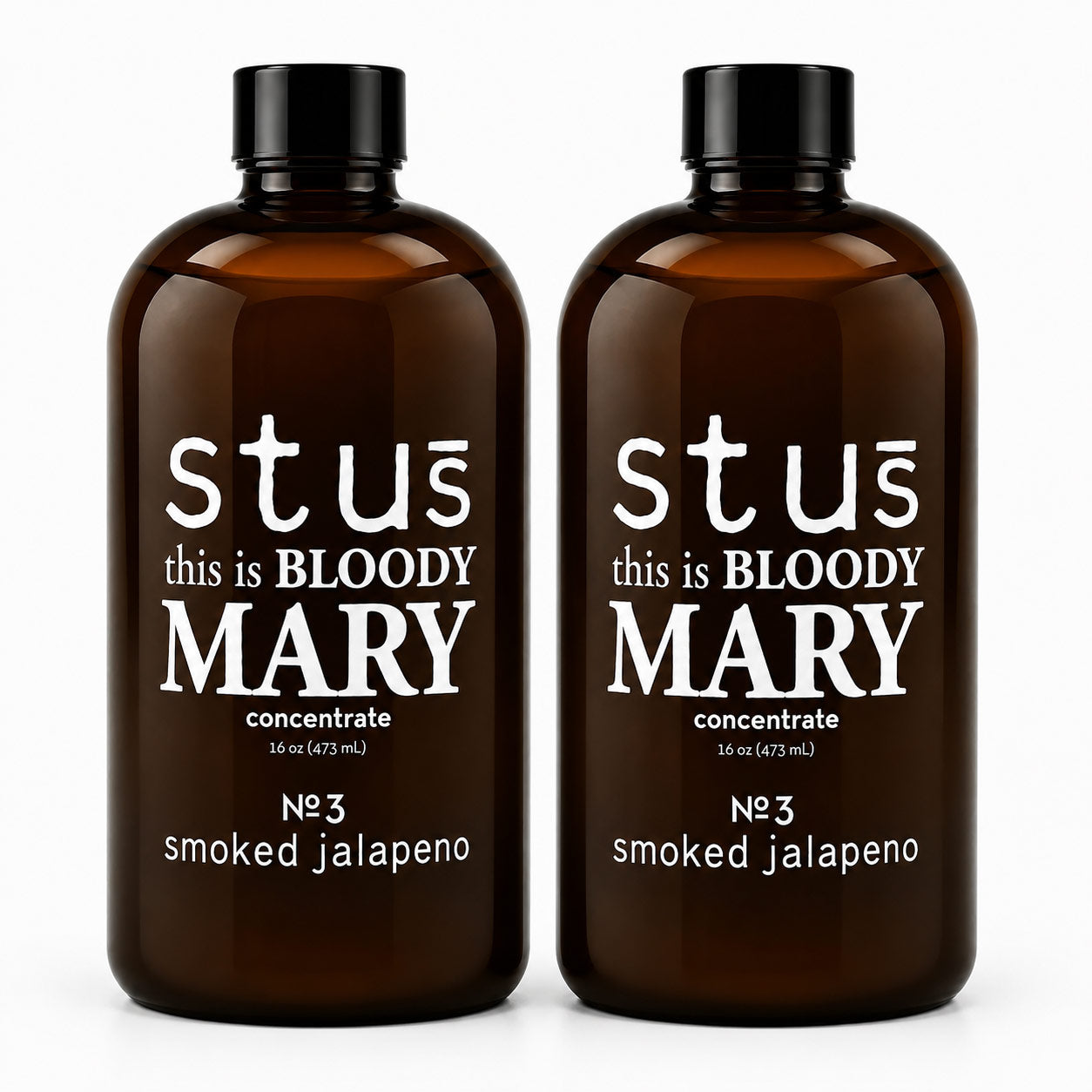Two amber glass bottles with black caps, labeled 'stus this is BLOODY MARY concentrate' and 'No 3 smoked jalapeno', shown on a white background.