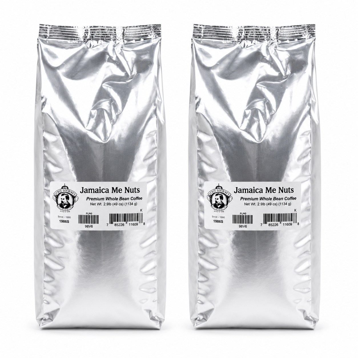 Two packages of Jamaica Me Nuts coffee on a white background