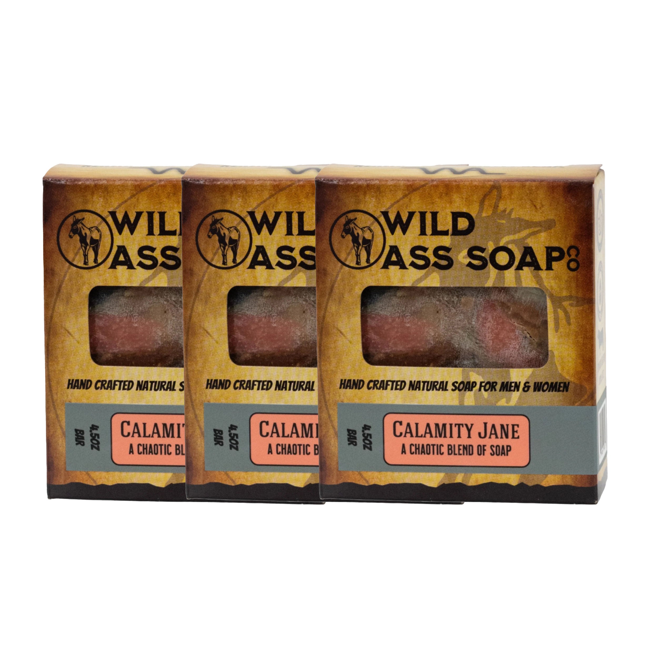 Three bars of Wild Ass Soap with packaging on a white background