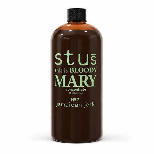 A 500 ml amber glass bottle of Stus Bloody Mary Jamaican Jerk seasoning, featuring a black cap and light green text on a white background.