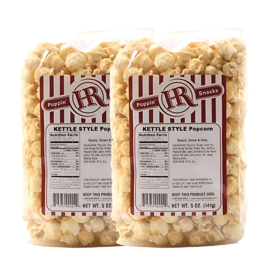 Two packages of kettle style popcorn with HR Poppin' Snacks branding on a white background.