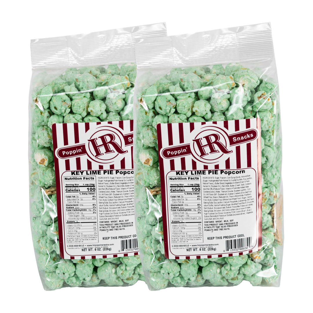 Two bags of key lime pie popcorn with HR Poppin' Snacks label on a white background
