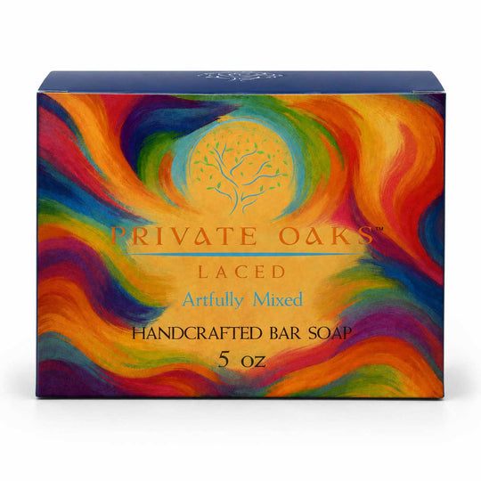 A 5 oz box of Private Oaks Laced Handcrafted Bar Soap, featuring a vibrant, multicolored abstract swirl design with a central tree of life motif on a white background.