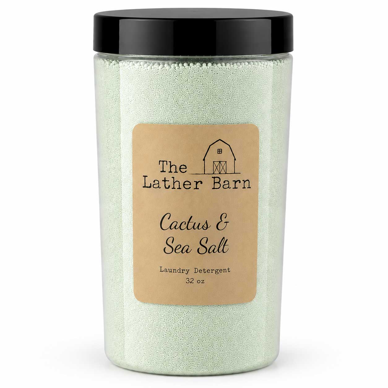 A 32 oz jar of The Lather Barn Cactus & Sea Salt laundry detergent. The product consists of pale green sea salt granules inside a clear plastic jar with a black lid and a tan paper label.