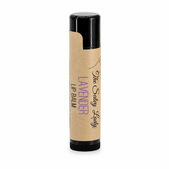 Lavender lip balm with a black cap on a white background