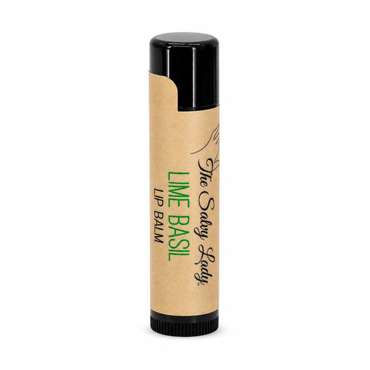 Lip balm tube labeled 'The Salty Lady Lime Basil' on a white background