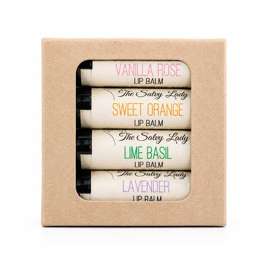 Set of lip balms in a cardboard box with visible labels.