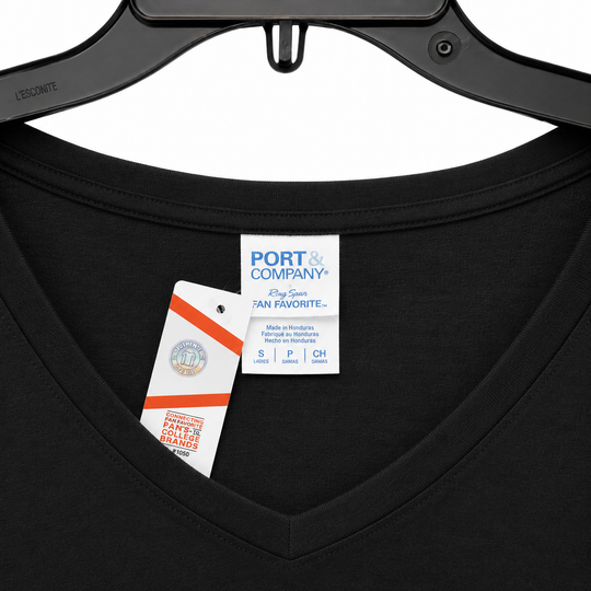 Black t-shirt with Port & Company tag on a hanger