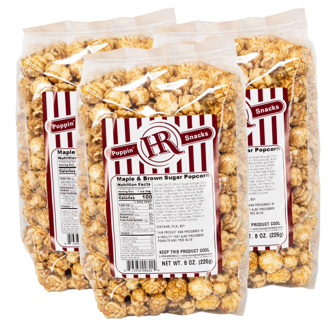 Three packages of HR Poppin' Snacks Maple & Brown Sugar Popcorn on a white background