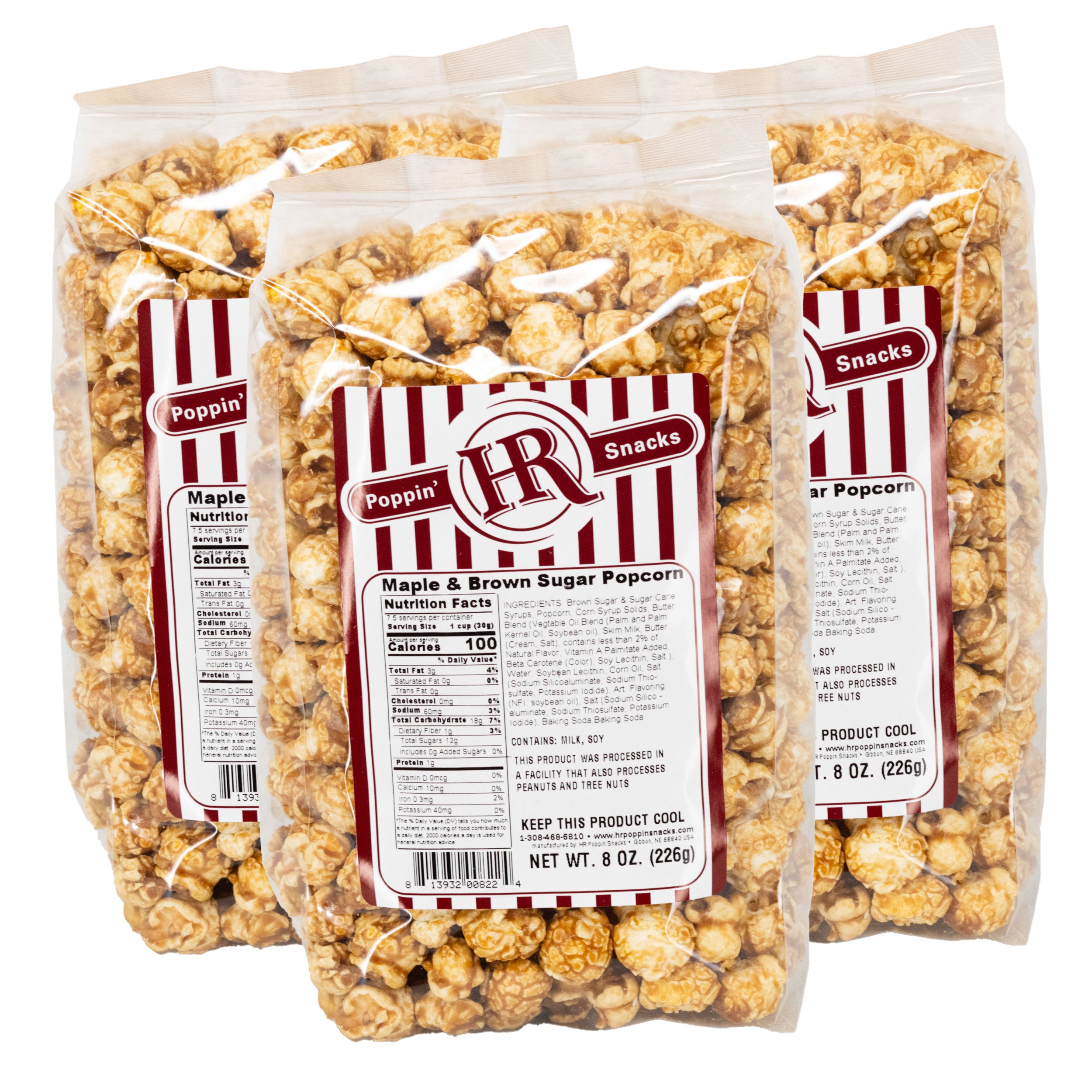 Three packages of HR Poppin' Snacks Maple & Brown Sugar Popcorn on a white background
