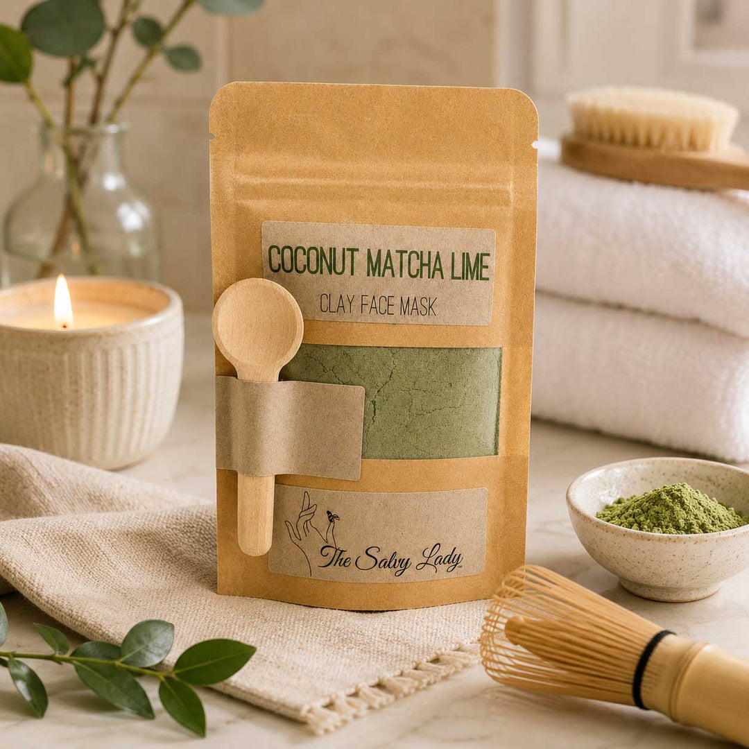 Coconut Matcha Lime Clay Face Mask packaging with a wooden spoon on a neutral background
