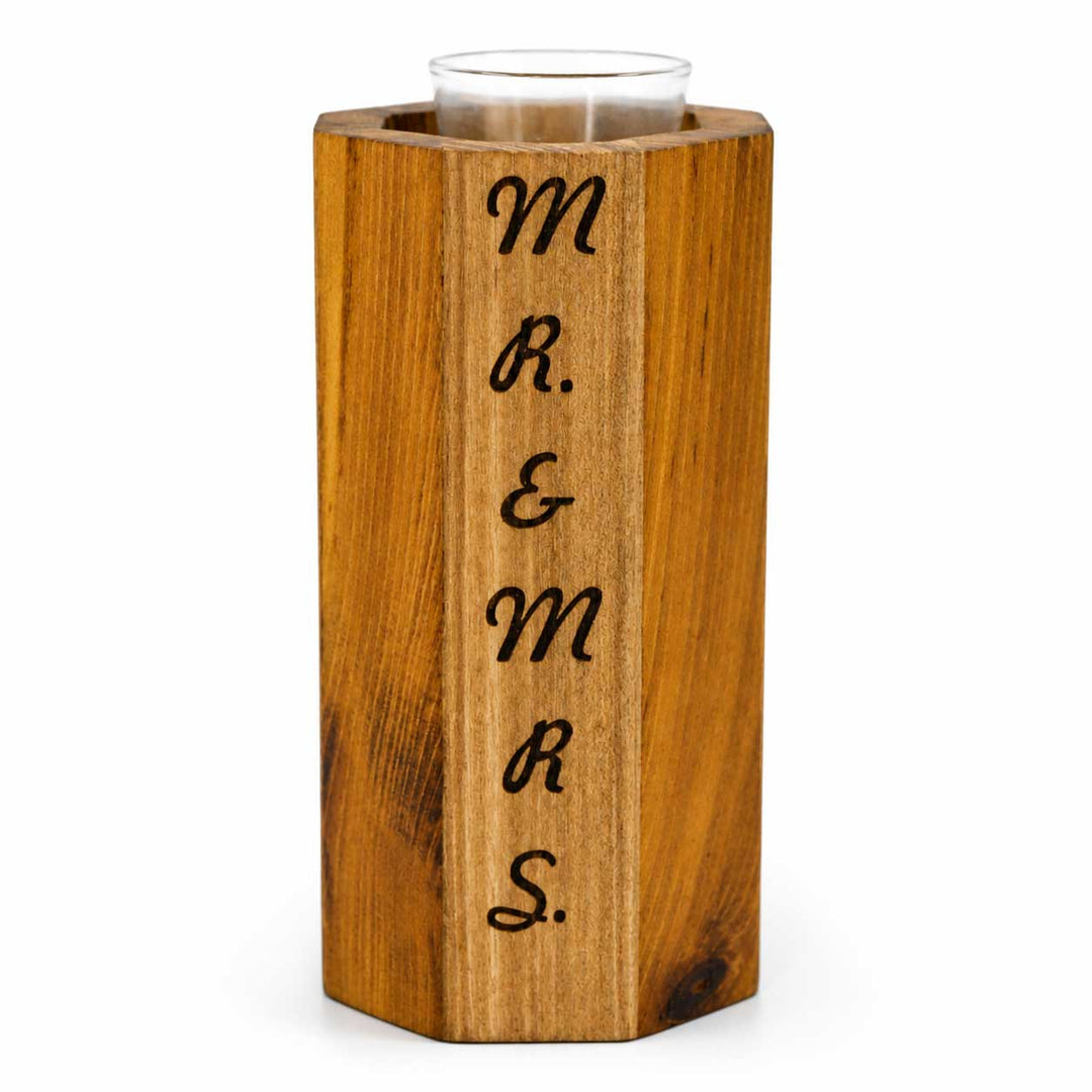 Wooden vase with 'MR & MRS' engraving on a white background