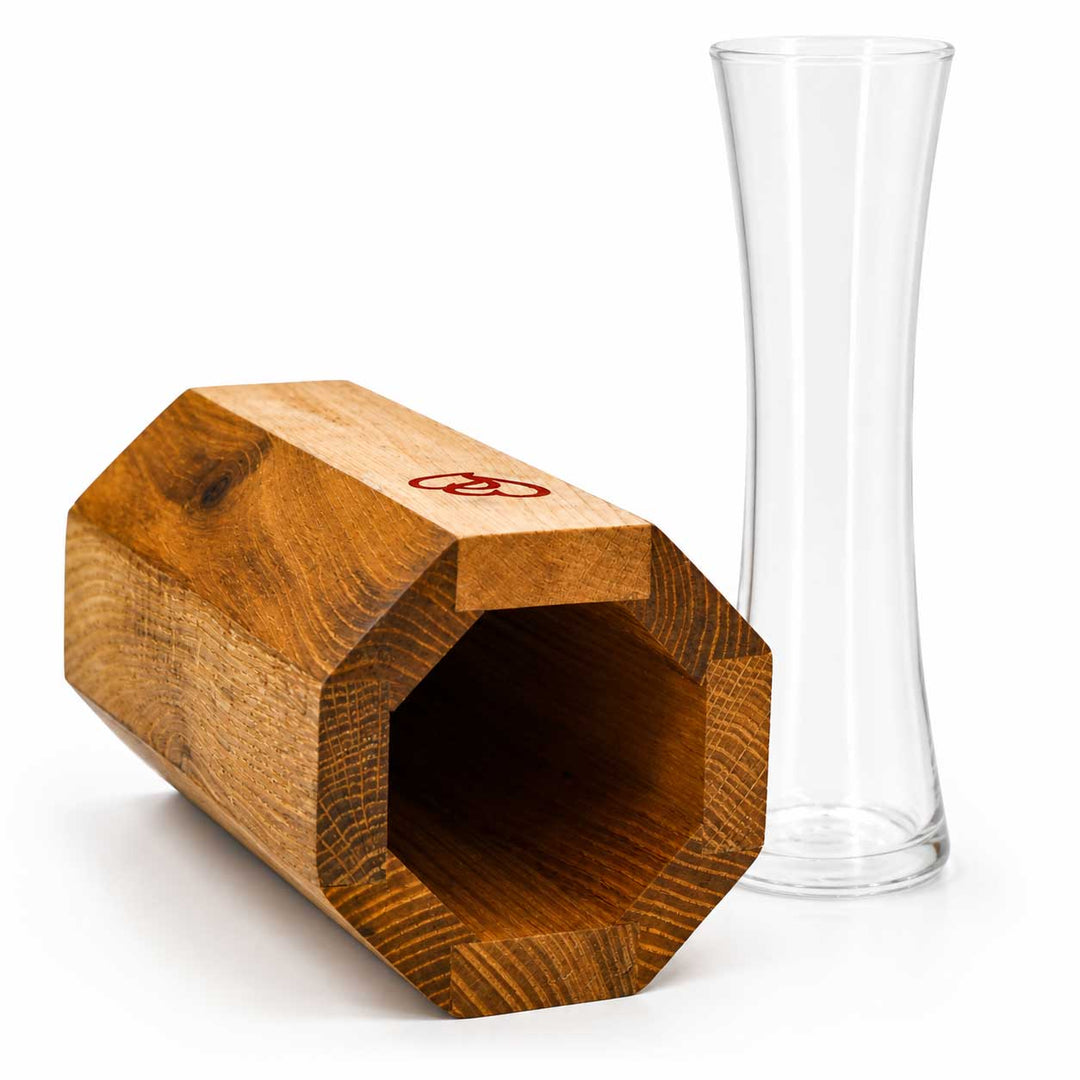 Wooden block with a glass on a white background