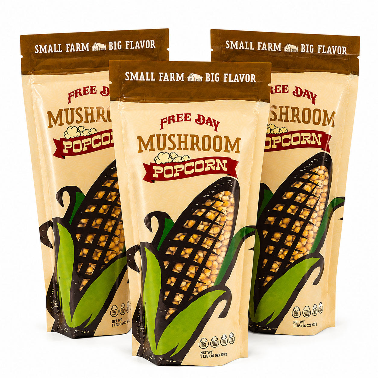 Three packages of Free Day Mushroom Popcorn on a white background