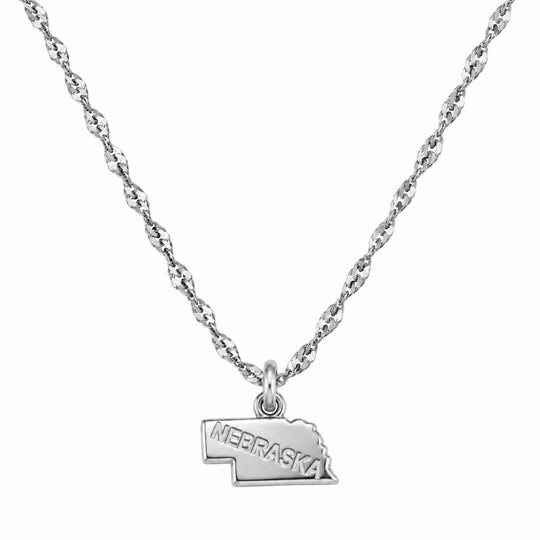 A silver necklace featuring a twisted rope chain and a small pendant shaped like the state of Nebraska, engraved with the word 'NEBRASKA', shown against a plain white background.