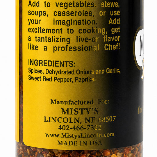Spice container label with text and ingredients on a black and yellow background