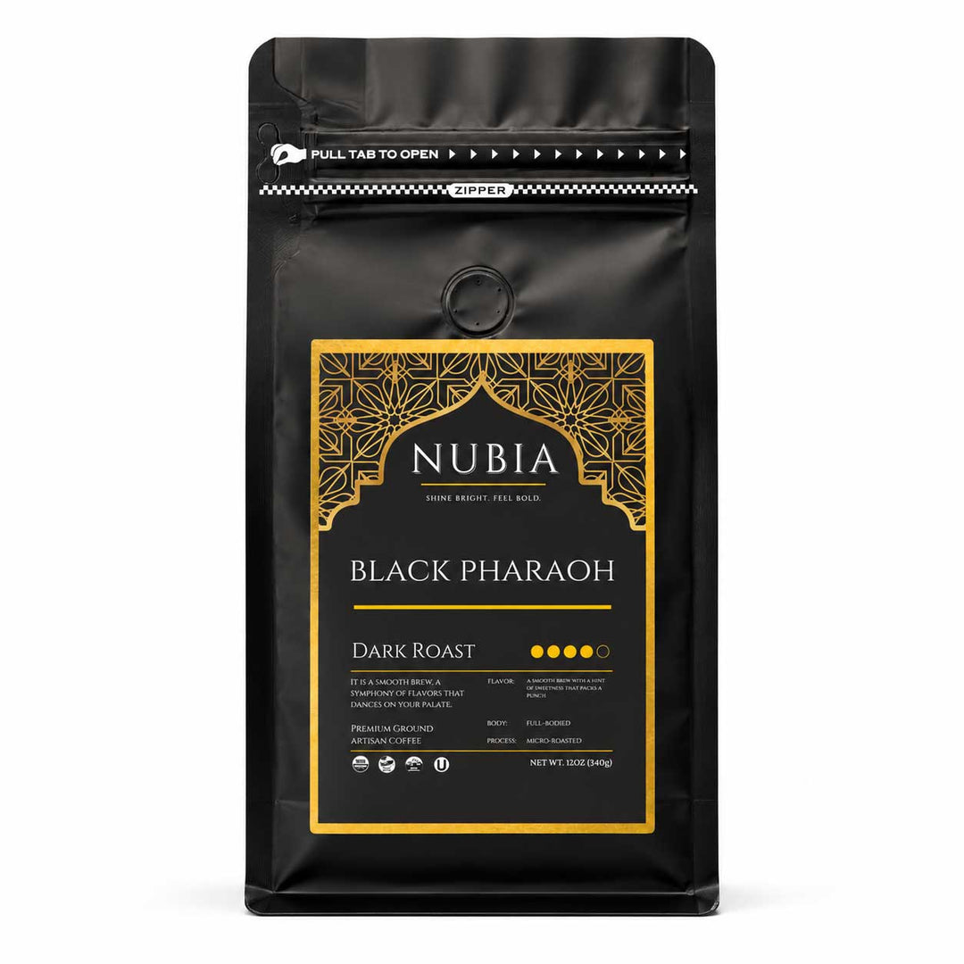 Black coffee packaging with gold label featuring 'Nubia Black Pharaoh Dark Roast' on a white background